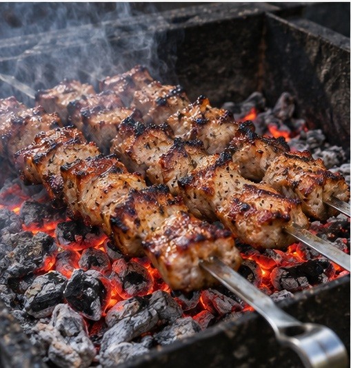 Grill over glowing coals, moving away from flare-ups.