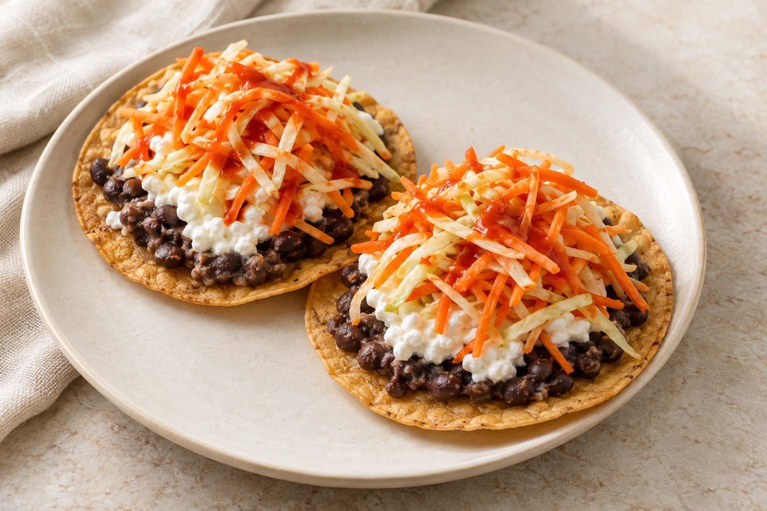 Serving suggestion for Sriracha Slaw Black Bean Cottage Cheese Tostadas